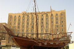 Dubai 01 03 Arabian Courtyard Hotel Outside With Dubai Museum Dhow.JPG